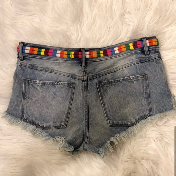 Free People distressed denim shorts with colorful stitch detailing - Picture 4 of 9